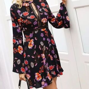 Boutique Boho floral dress with bell sleeve size s